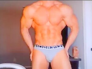 Faceless Bodybuilder Showing Off