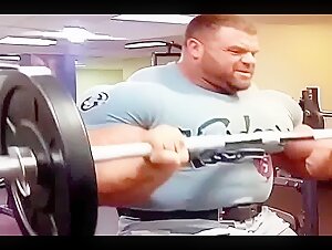 Massive manly powerful Biceps in tight T-Shirt