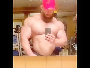 Giant man mirror posing and heavy breathing