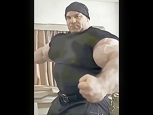 Huge Massive Biceps in tight T-Shirt