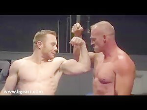Muscle guys leopard thong wrestling