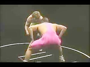 Bodybuilders wrestling in lycra singlets