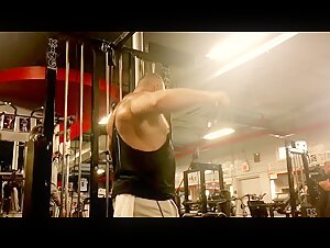 Butch Stratford flexes